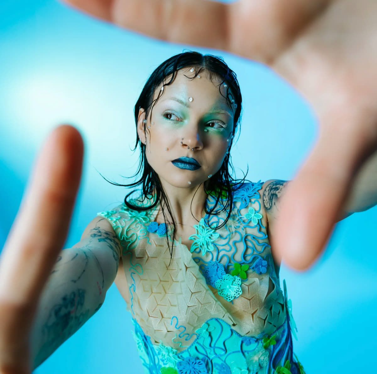 Bioluminescence dress worn on a model, full view